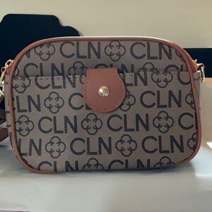 Brown Crossbody Bag with Monogram Pattern and Chain Strap